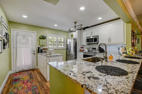 6080 N Sabal Palm Blvd # 203, Tamarac FL 33319