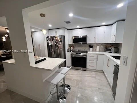 6100 NW 44th St # 104, Lauderhill FL 33319