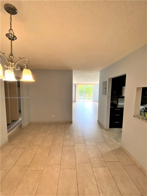 1465 NE 123rd St # 302, North Miami FL 33161