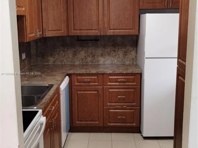 447 NE 195th St # 117, Miami FL 33179