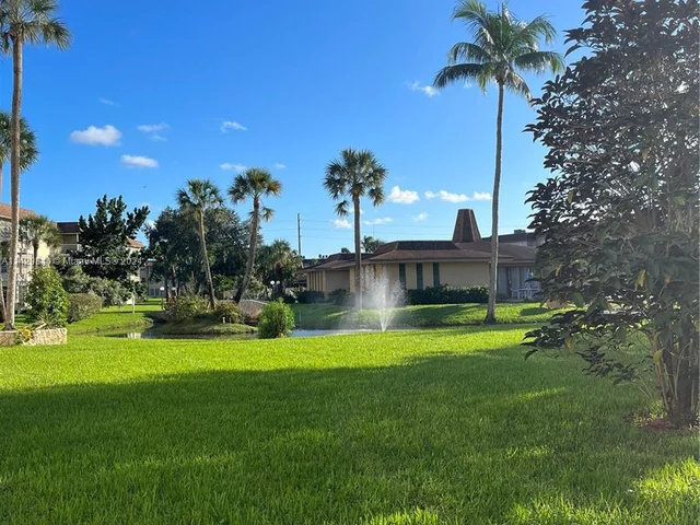 5071 W Oakland Park Blvd # 205, Lauderdale Lakes FL 33313