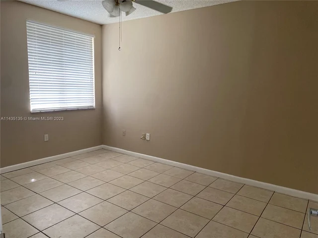 7950 N Nob Hill Rd # 104, Tamarac FL 33321