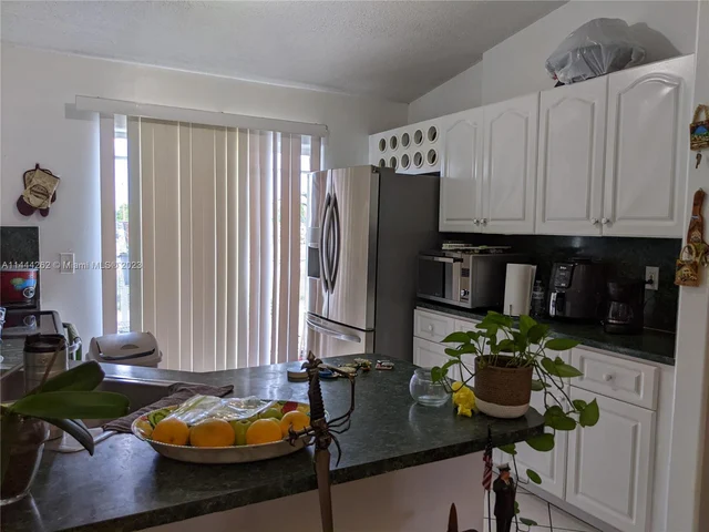 10903 W Okeechobee Rd # 202, Hialeah Gardens FL 33018