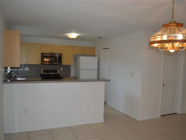 13990 SW 260th St # 102, Homestead FL 33032