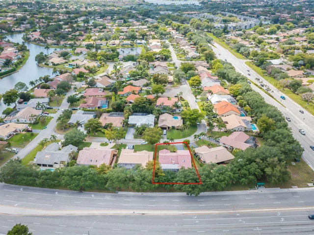 695 NW 107th Ln, Coral Springs FL 33071