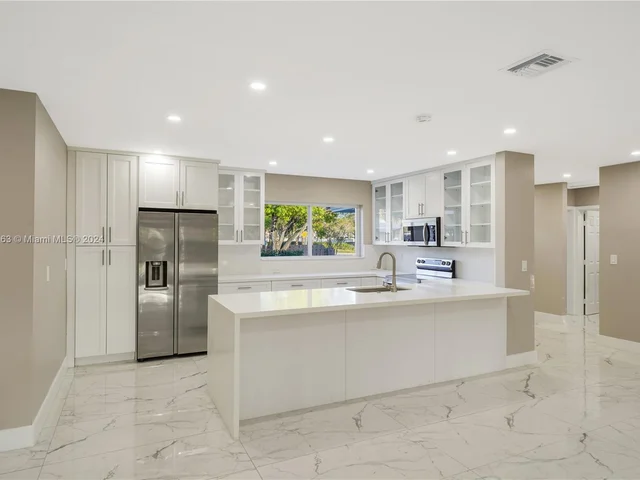 1443 S Cypress Road, Pompano Beach FL 33060