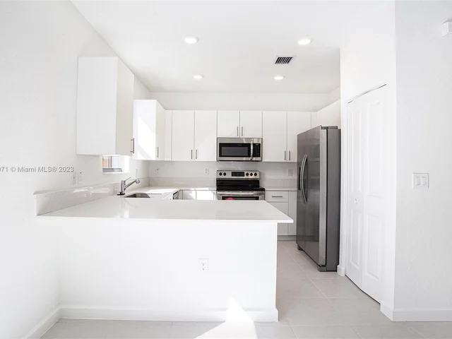 11964 NW 47TH MANNOR, Coral Springs FL 33076