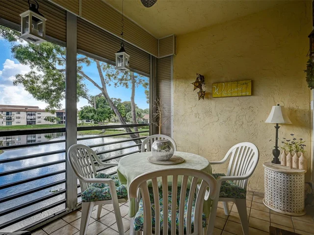 6080 N Sabal Palm Blvd # 203, Tamarac FL 33319