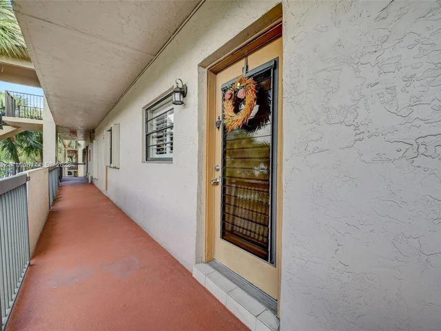 6080 N Sabal Palm Blvd # 203, Tamarac FL 33319