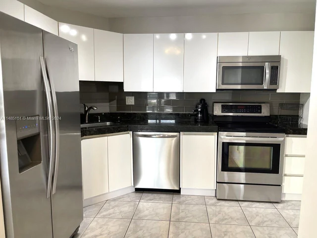 100 Golden Isles Dr # 909, Hallandale Beach FL 33009