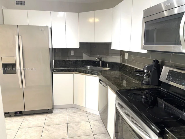 100 Golden Isles Dr # 909, Hallandale Beach FL 33009