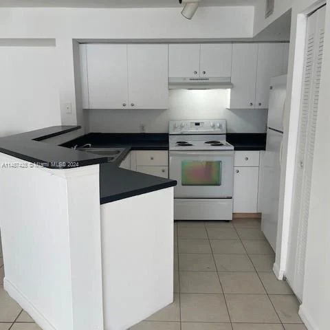 4211` SAN MARINO BLVD # 106, West Palm Beach FL 33409