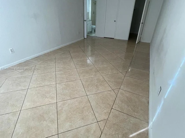 494 NW 165th St Rd # 105, Miami FL 33169