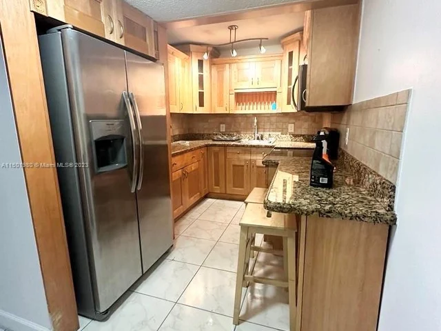 5050 NW 7th St # 411, Miami FL 33126