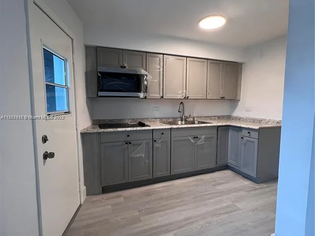 1610 NW N River Dr # 208, Miami FL 33125