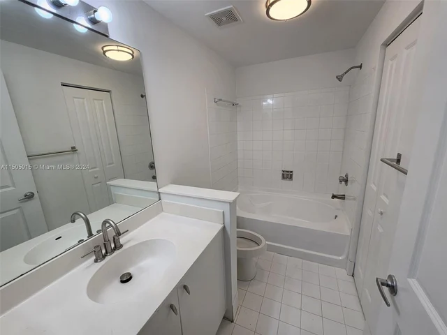 5960 W Sample Rd # 302, Coral Springs FL 33067