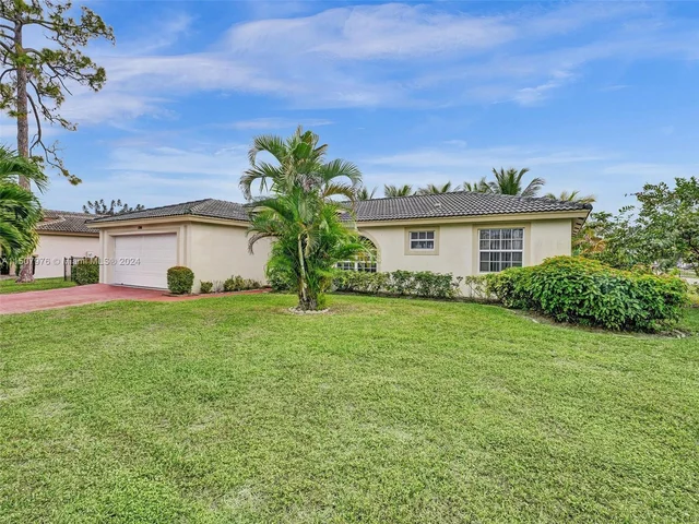 100 Cocoplum Cir, Royal Palm Beach FL 33411