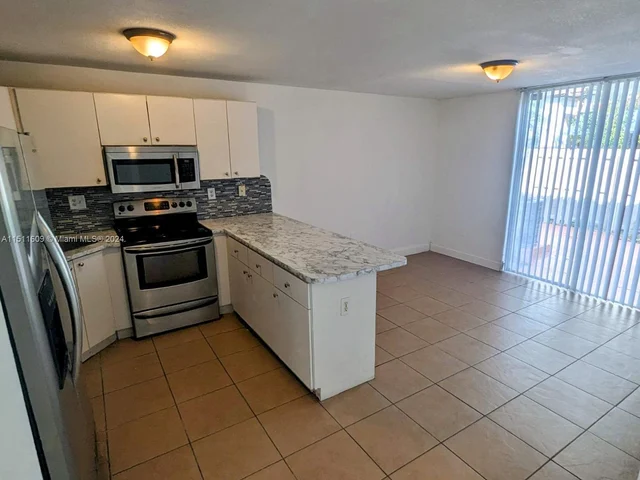 16011 SW 87th Ter, Miami FL 33193