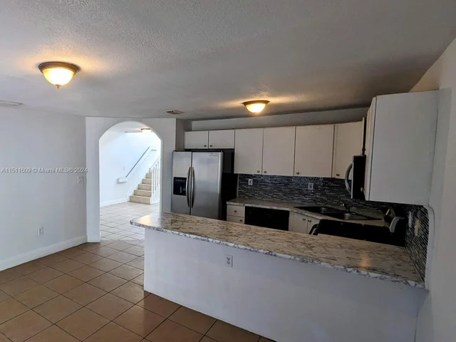 16011 SW 87th Ter, Miami FL 33193