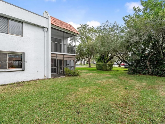 304 Racquet Club Rd # 101, Weston FL 33326