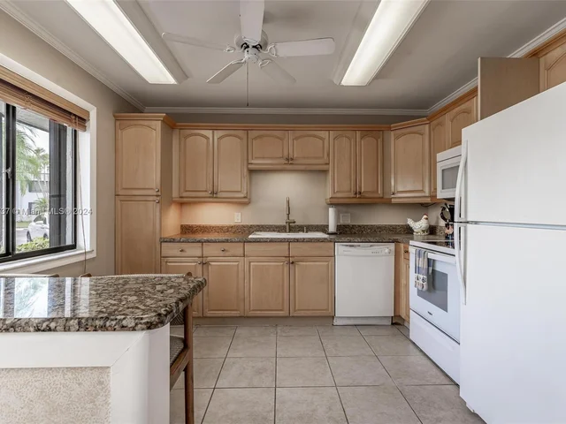 304 Racquet Club Rd # 101, Weston FL 33326