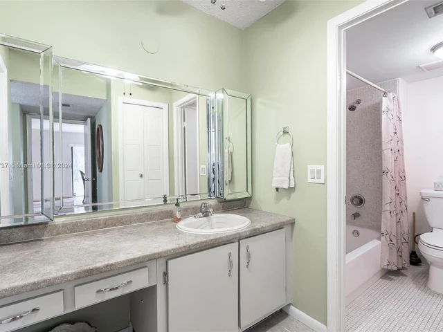 304 Racquet Club Rd # 101, Weston FL 33326