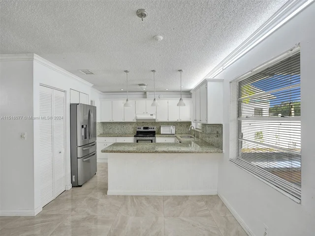 12126 NW 33rd St, Coral Springs FL 33065