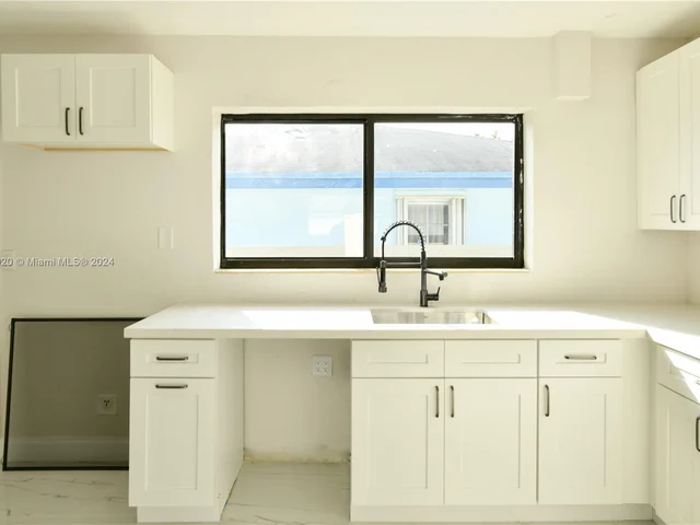 1231 NW 68th St, Miami FL 33147