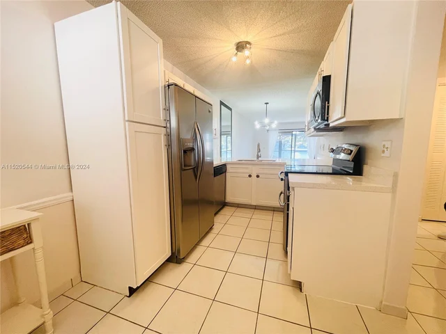 9676 W Mcnab Rd # 110, Tamarac FL 33321