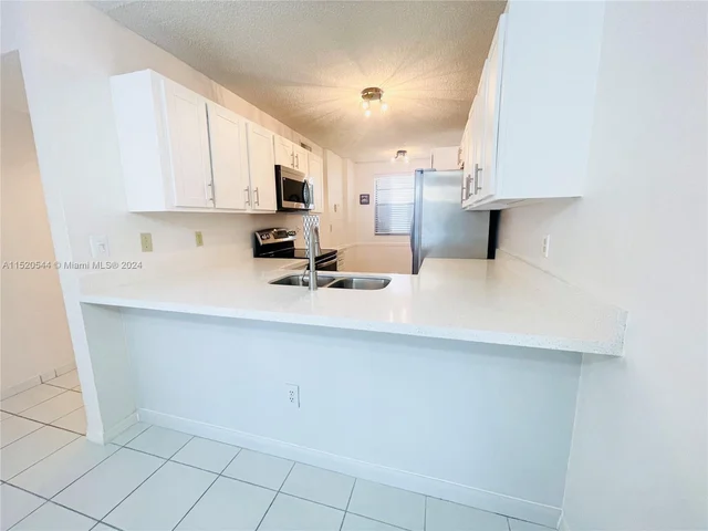 9676 W Mcnab Rd # 110, Tamarac FL 33321