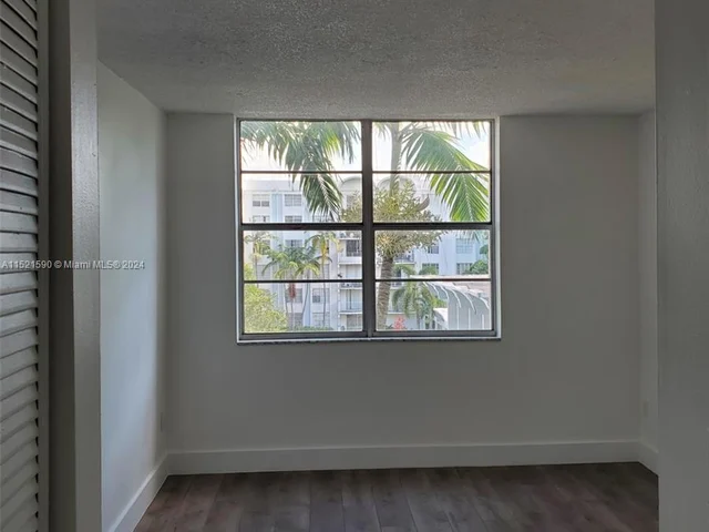 496 NW 165th St Rd # 412, Miami FL 33169