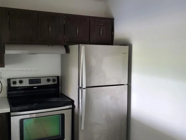 496 NW 165th St Rd # 412, Miami FL 33169