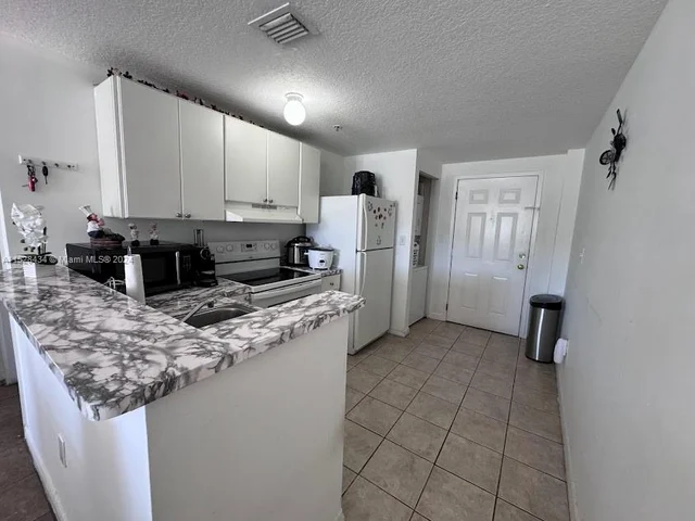 218 SW 8th Ave # 205, Miami FL 33130