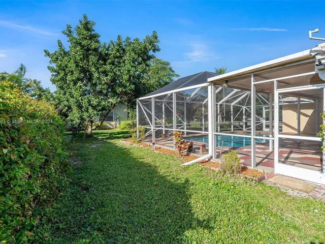 10100 Ramblewood Dr, Coral Springs FL 33071