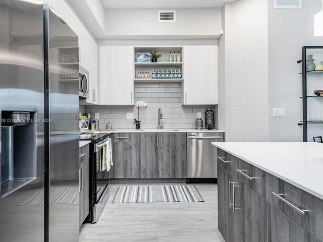 9375 W COMMERCIAL BLVD # 401, Tamarac FL 33351