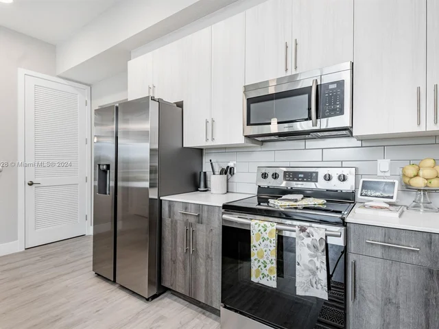 9375 W COMMERCIAL BLVD # 401, Tamarac FL 33351