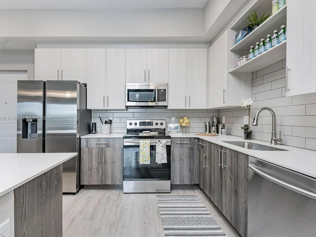 9375 W COMMERCIAL BLVD # 401, Tamarac FL 33351