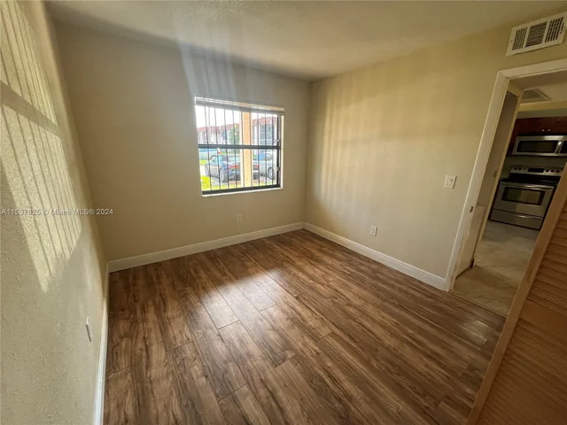 861 NE 209th Ter # 104, Miami FL 33179