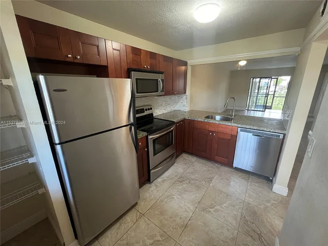 861 NE 209th Ter # 104, Miami FL 33179