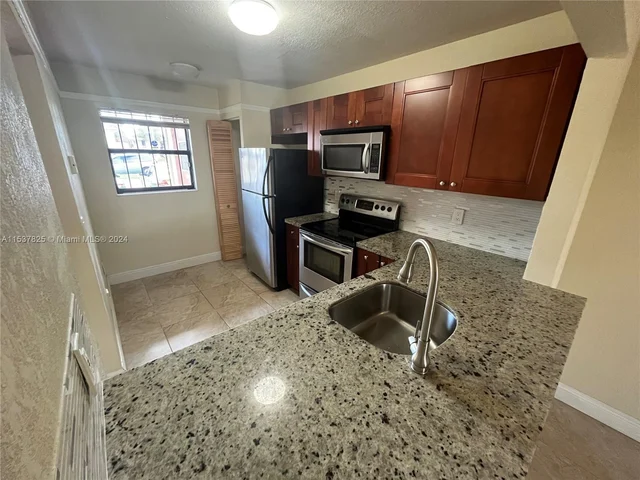 861 NE 209th Ter # 104, Miami FL 33179