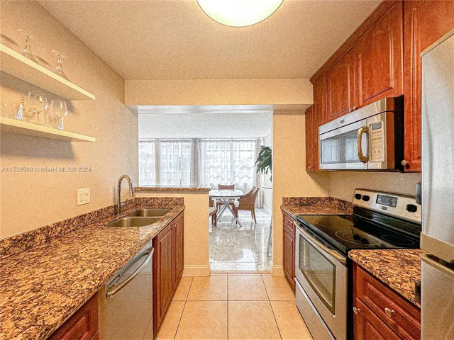 430 Golden Isles Dr # 205, Hallandale Beach FL 33009