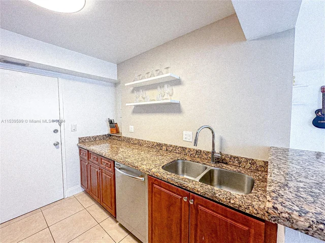 430 Golden Isles Dr # 205, Hallandale Beach FL 33009