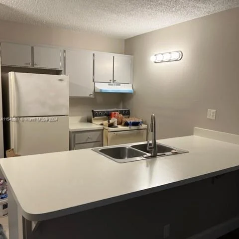 2701 Riverside Dr # B, Coral Springs FL 33065