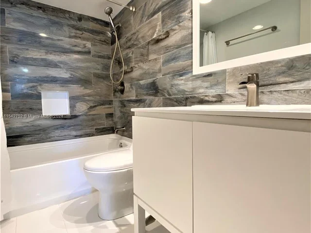 1465 NE 123rd St # 302, North Miami FL 33161