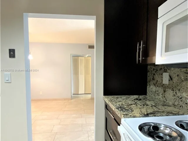 1465 NE 123rd St # 302, North Miami FL 33161