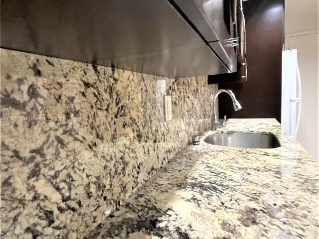 1465 NE 123rd St # 302, North Miami FL 33161