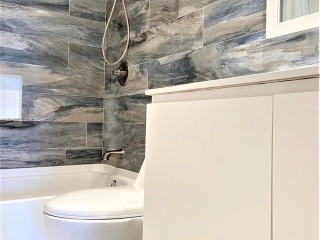 1465 NE 123rd St # 302, North Miami FL 33161