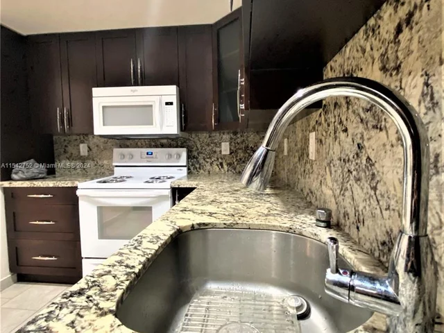 1465 NE 123rd St # 302, North Miami FL 33161