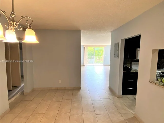 1465 NE 123rd St # 302, North Miami FL 33161