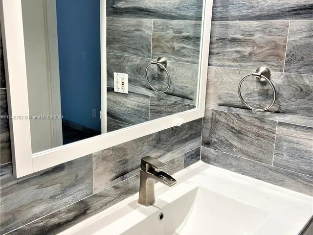 1465 NE 123rd St # 302, North Miami FL 33161